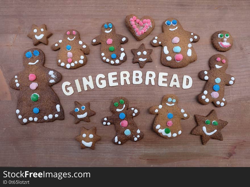 Homemade gingerbreak cookies with wooden letters text