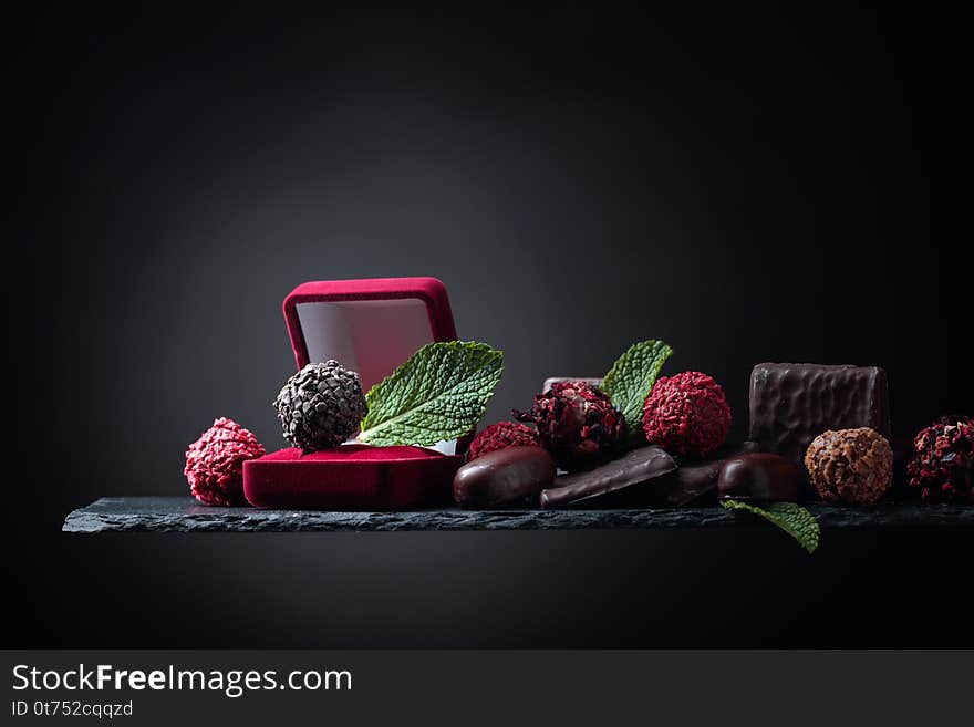 Chocolate truffle in red gift box