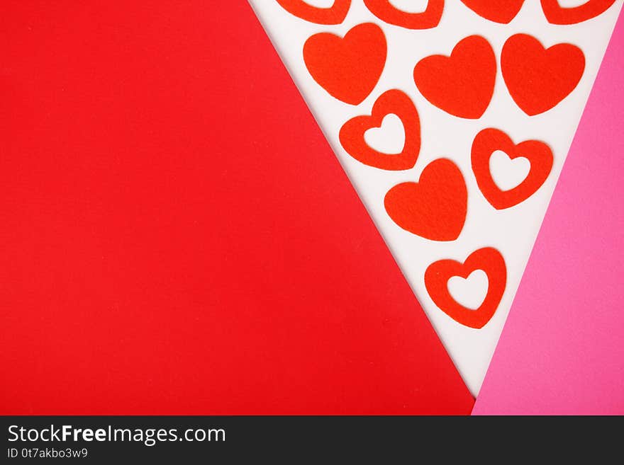 Red and pink flat background with hearts for Valentine Day celebration