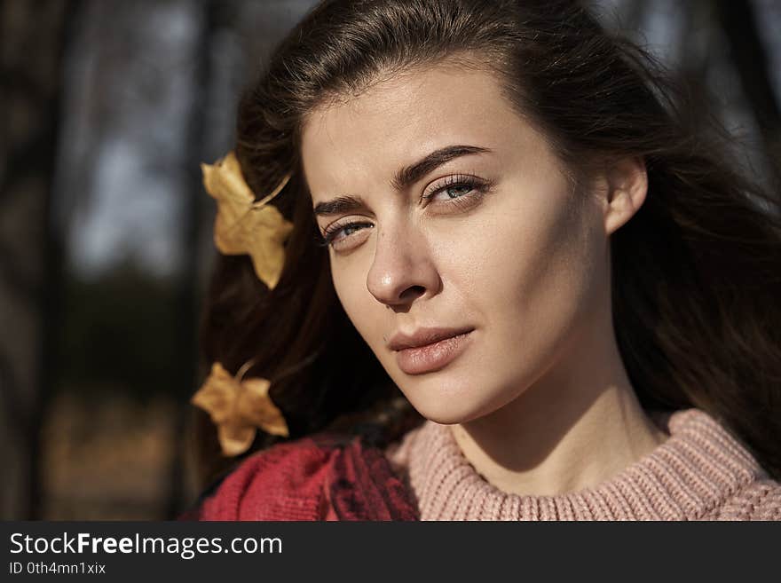 Close-up of feminine lady, hair fluttering in wind