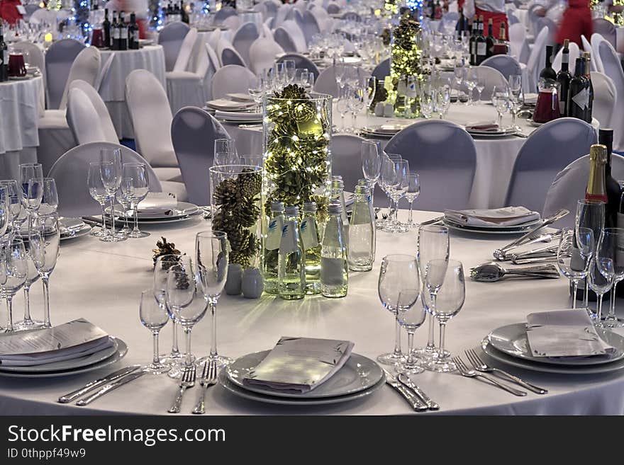 New Year festive table in a restaurant.
Beautiful Christmas table setting. New Year festive table in a restaurant.
Beautiful Christmas table setting.