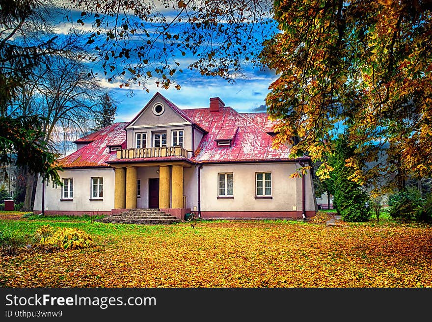 Historic palace surrounded by autumn park, central Poland. Historic palace surrounded by autumn park, central Poland.