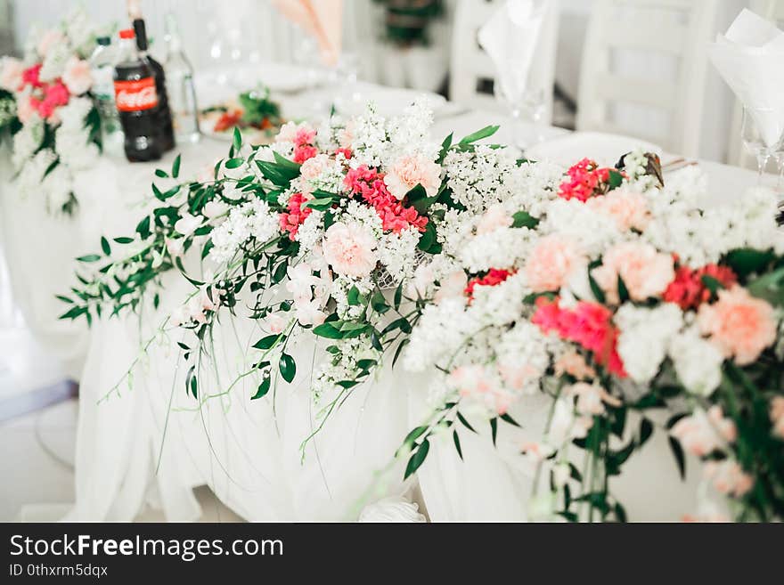 Interior of a restaurant prepared for wedding ceremony.