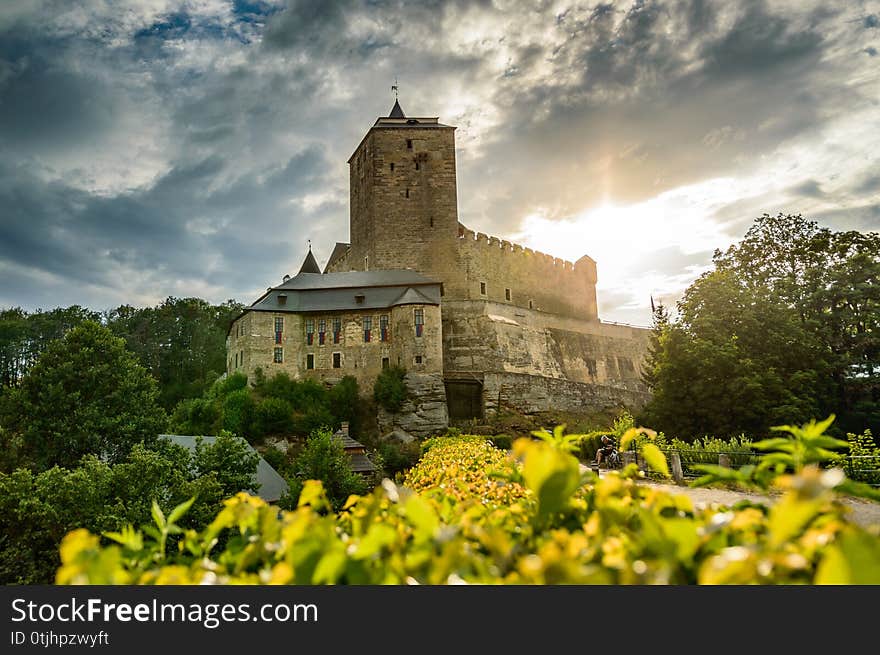 View Of The Kost Castle On The Hill At Sunset