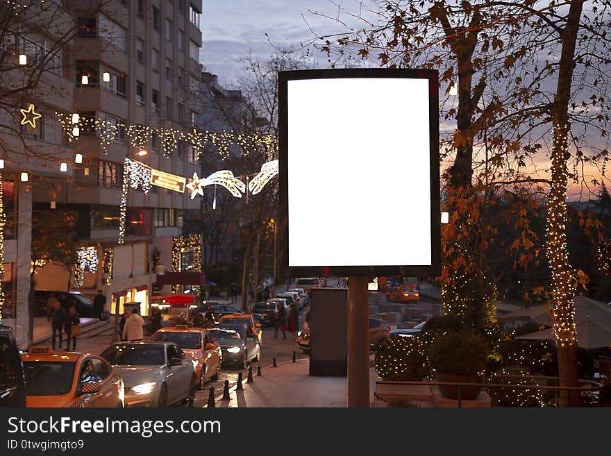 Blank billboard on night street