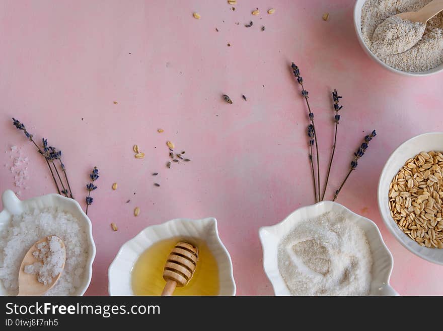 Natural wellness beauty ingredients on pink background. Health care spa therapy