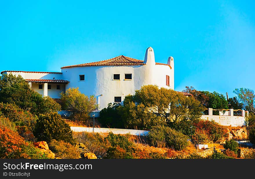 Baja Sardinia architecture and nature in Costa Smeralda reflex