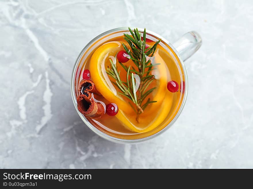 Aromatic mulled wine on grey marble table