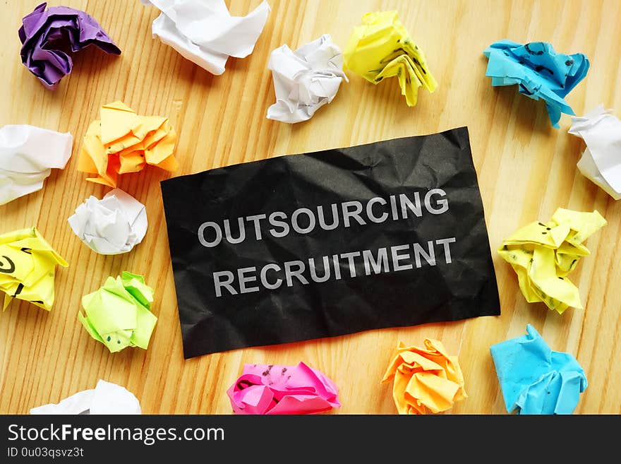 Conceptual hand written text is showing outsourcing recruitment