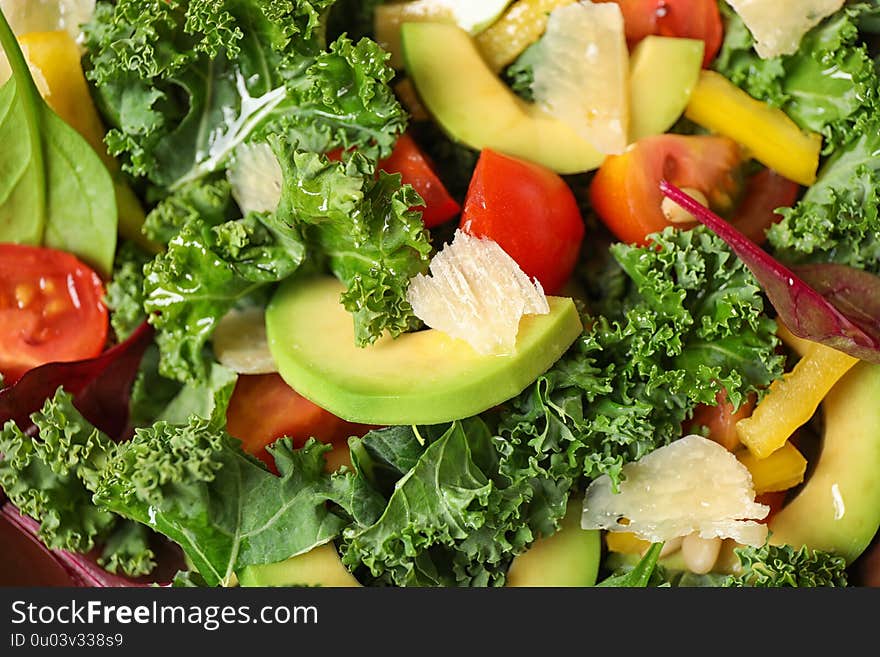 Tasty fresh kale salad as background, closeup