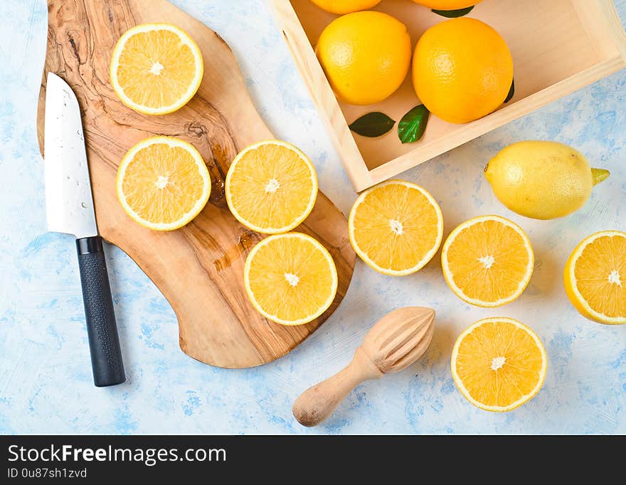 Healthy food, background, halves of oranges sliced for making orange juice