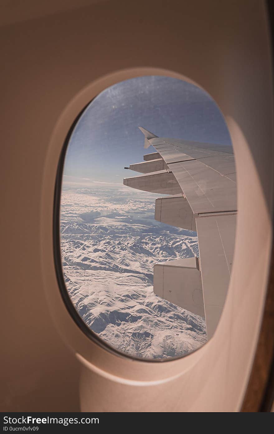 Looking outside an airplane window,