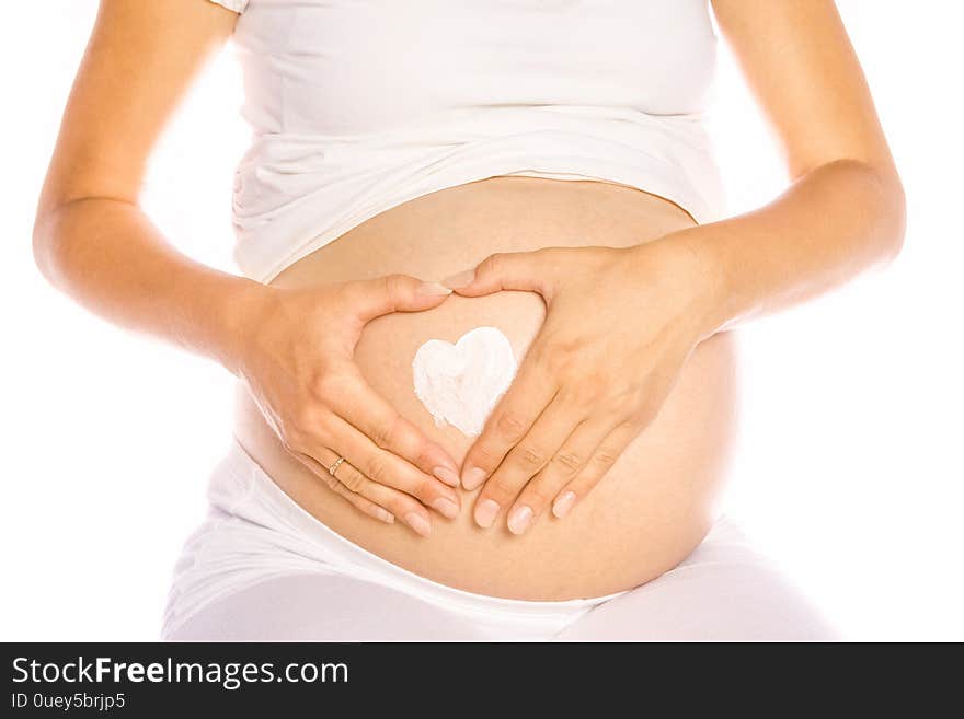 Happy Pregnant Girl Lies On White Background