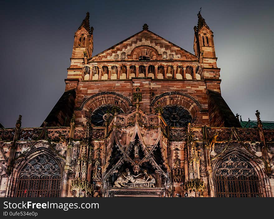 The side facade of the Cathedral in Strasbourg, richly decorated with sculptural compositions, France