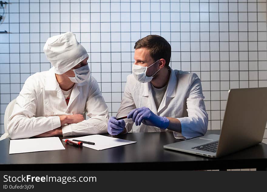 Doctor, Computer, Healthcare And Medicine. Two doctors working together in the office.