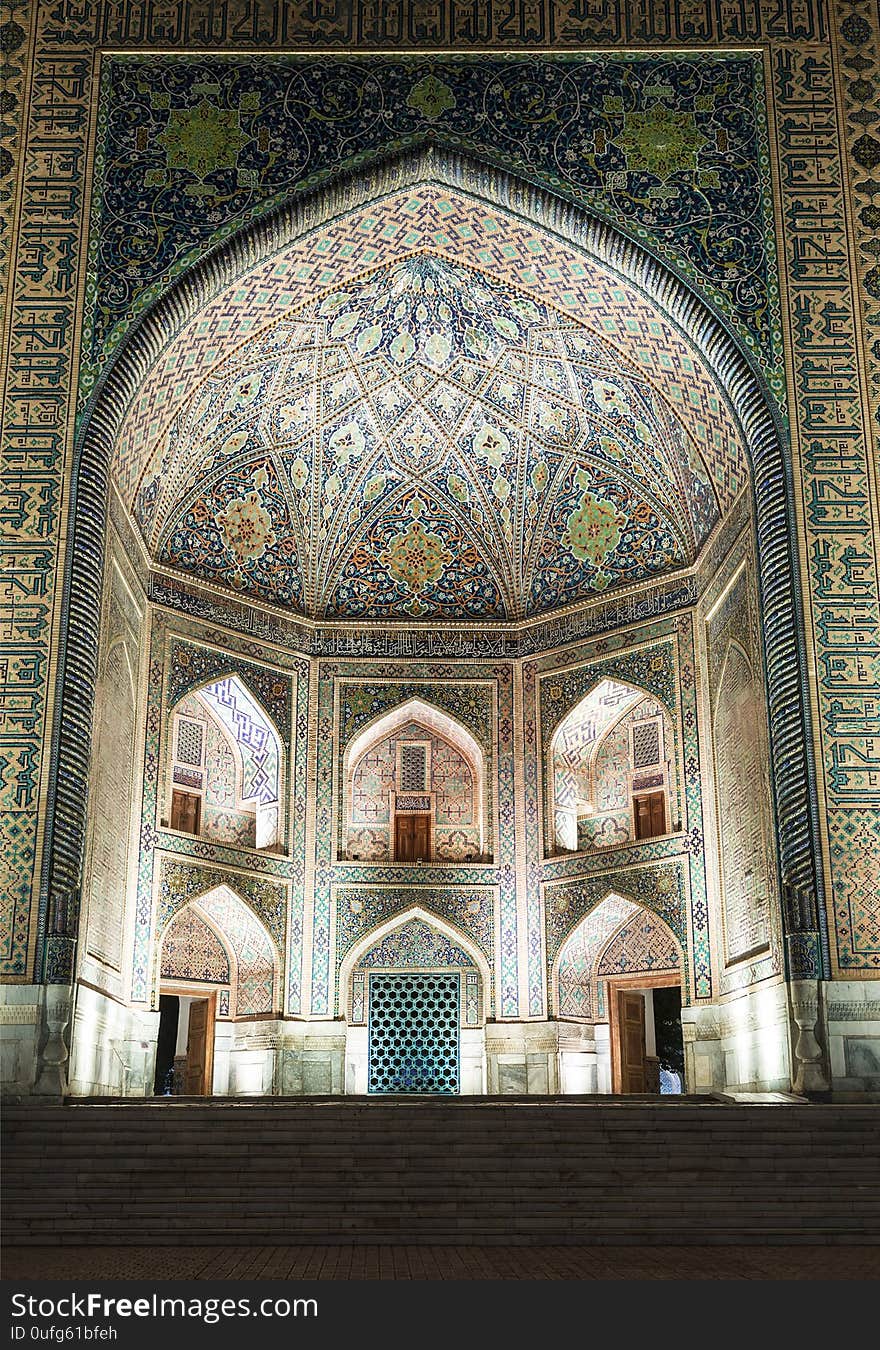 Registan square in Samarkand, Tillya-Kari madrasah 17th century. The fragment of main entrance portal. Uzbekistan