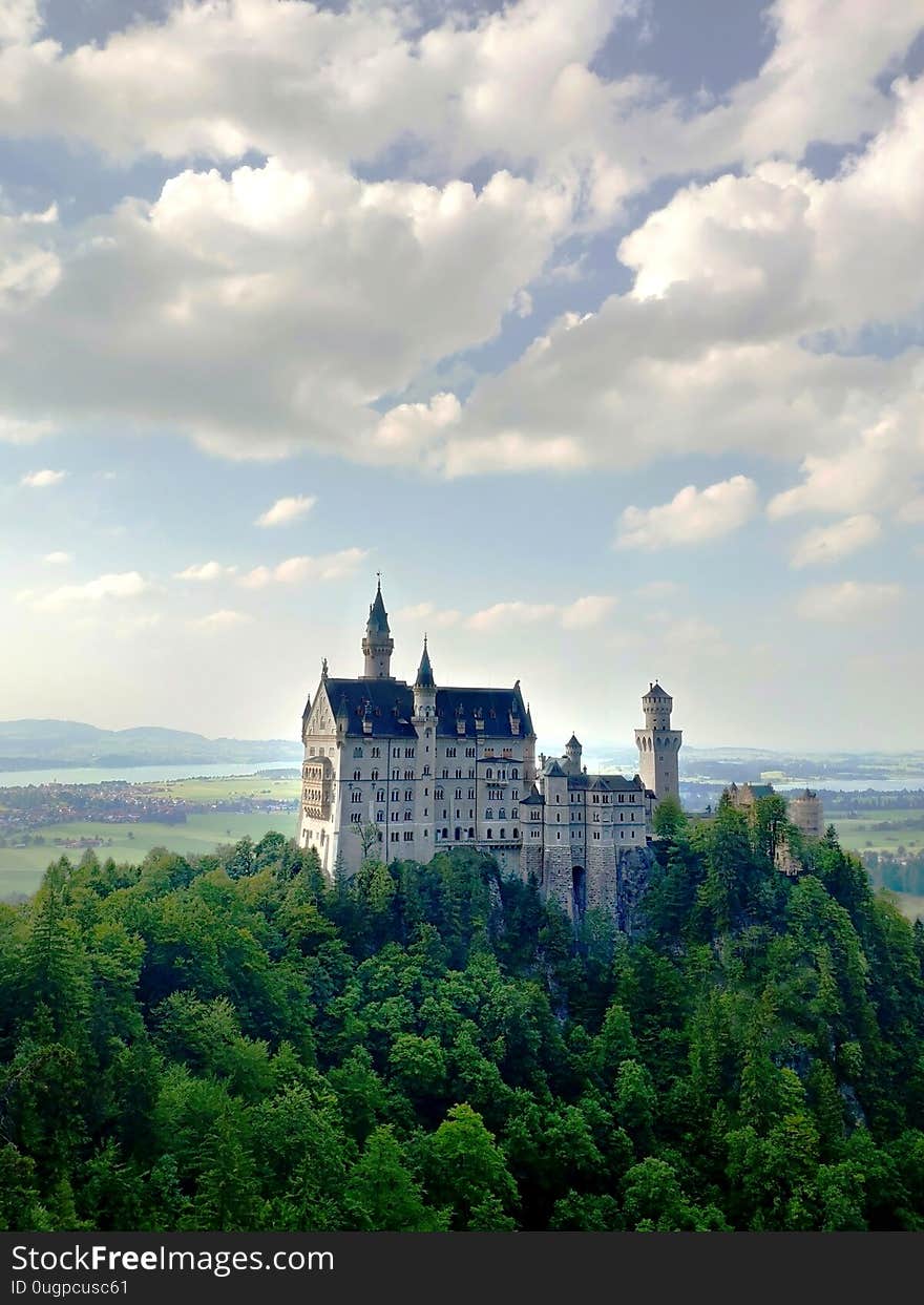 Fussen, Germany - June 27, 2019: Famous Neuschwanstein Castle in the Bavarian Alps. Romanesque Revival palace in Germany. Fussen, Germany - June 27, 2019: Famous Neuschwanstein Castle in the Bavarian Alps. Romanesque Revival palace in Germany