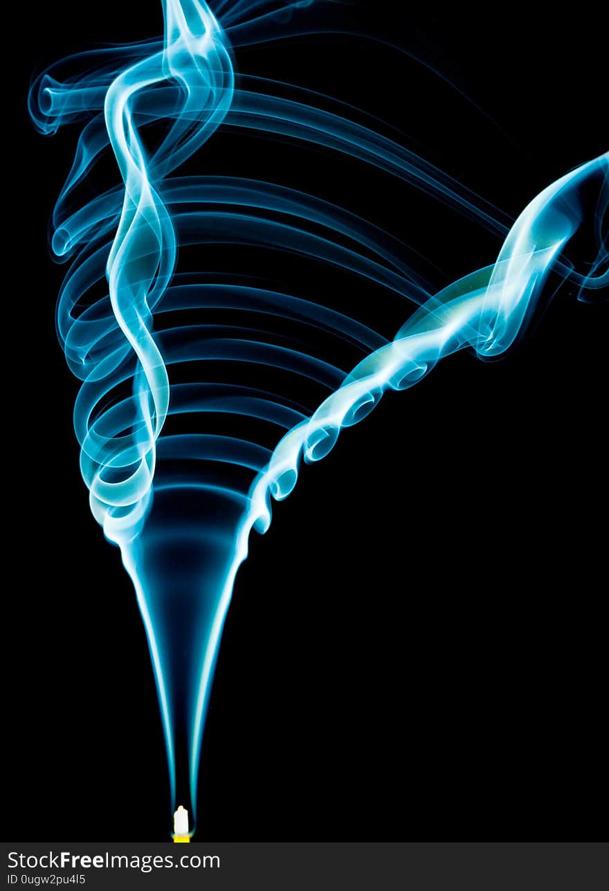 Blue smoke on black background. Smoke and fog spreads and goes from bottom to top and right corner. Blue smoke on black background. Smoke and fog spreads and goes from bottom to top and right corner