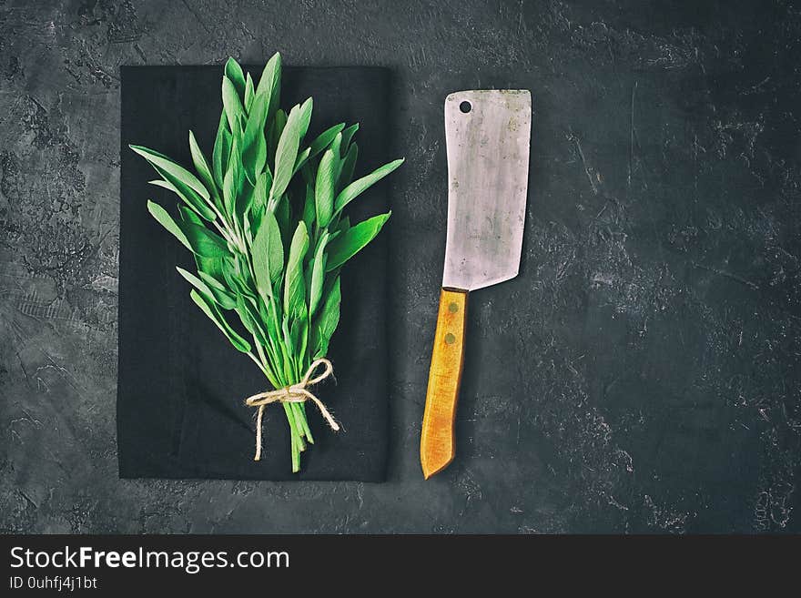 Sage  bunch on  dark  table. Top view copy space. Sage  bunch on  dark  table. Top view copy space