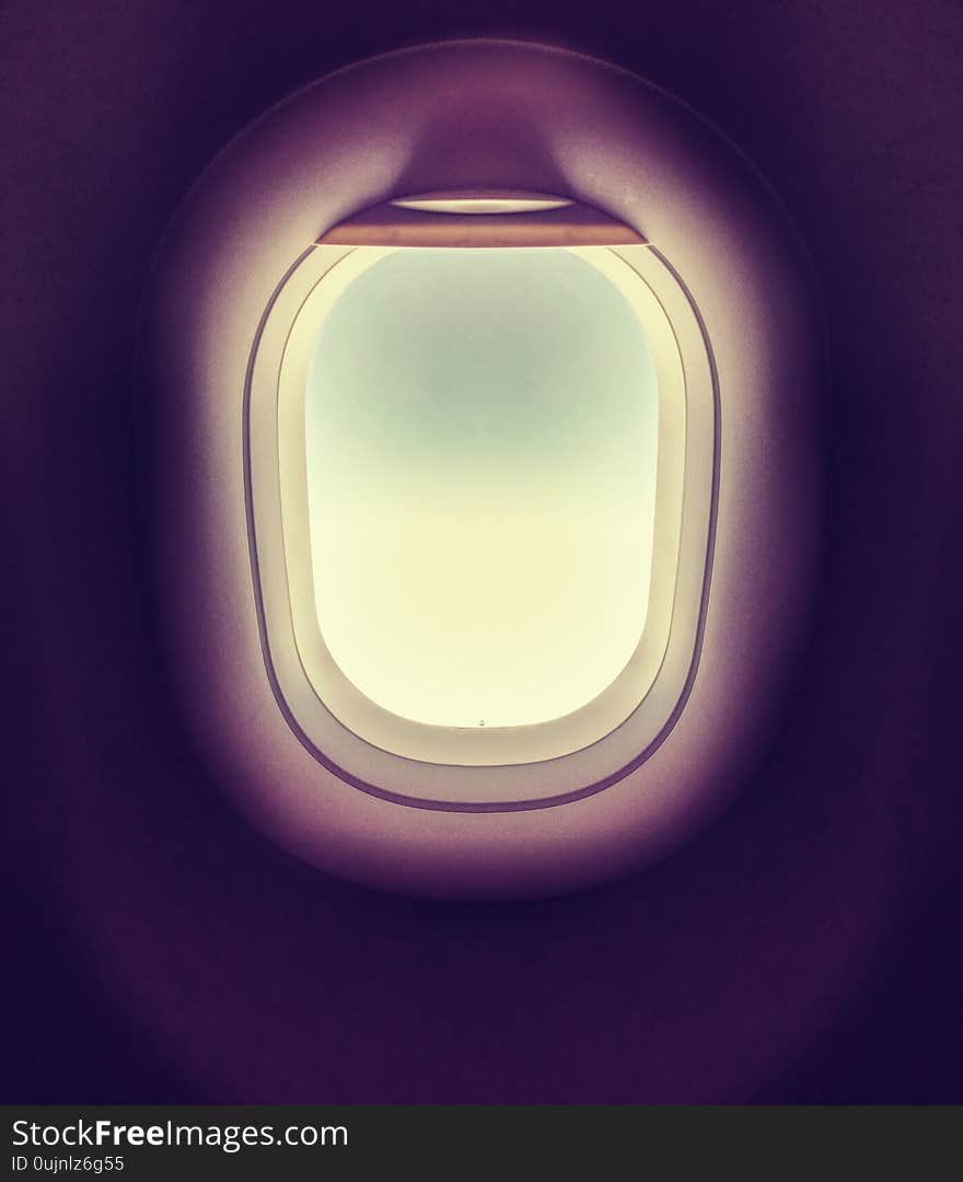 Deep blue sky in the airplane porthole