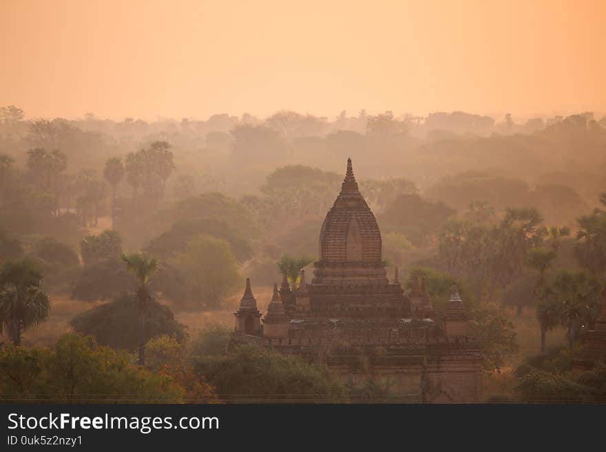 Sunrise over the valley with the ancient pagodas in Bagan