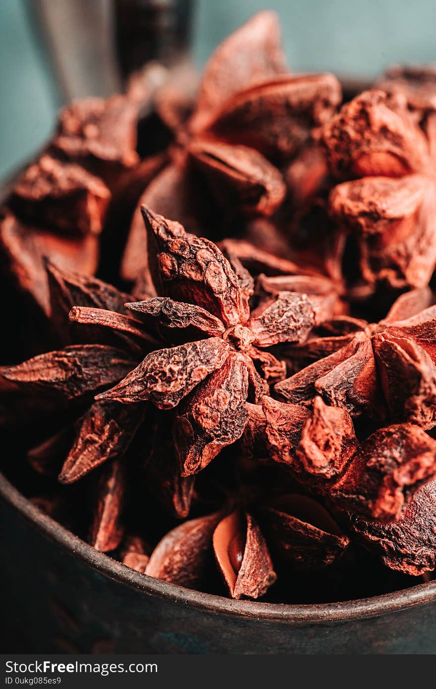 Dried anise stars on the rustic background