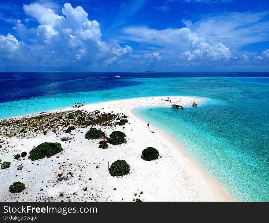 Aerial view of the stunning white sandbank with beautiful sandy beaches of Maldives