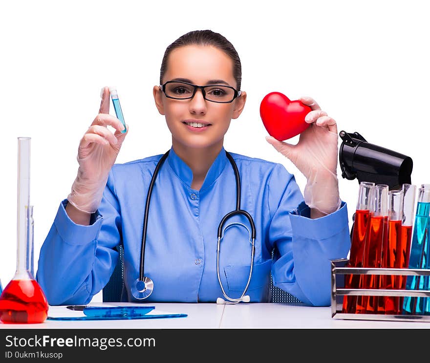 Young female doctor in lab isolated on white