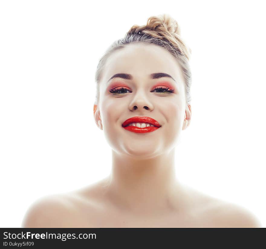 Young blond real woman with bright make up smiling pointing gesturing emotional isolated like doll lashes closeup