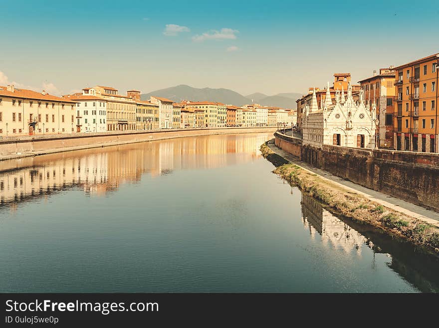 Famous small Santa Maria della Spina Church in Pisa on a bank of Arno river