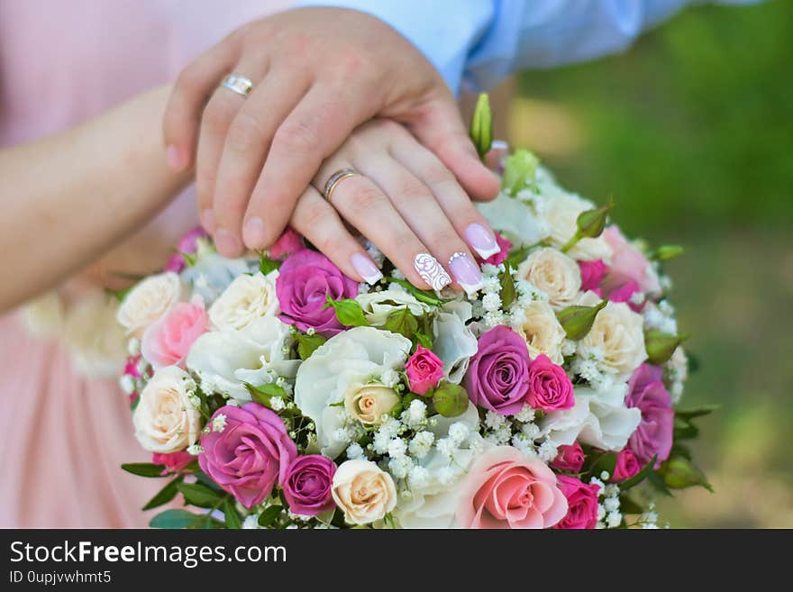 Wedding rings in flowers