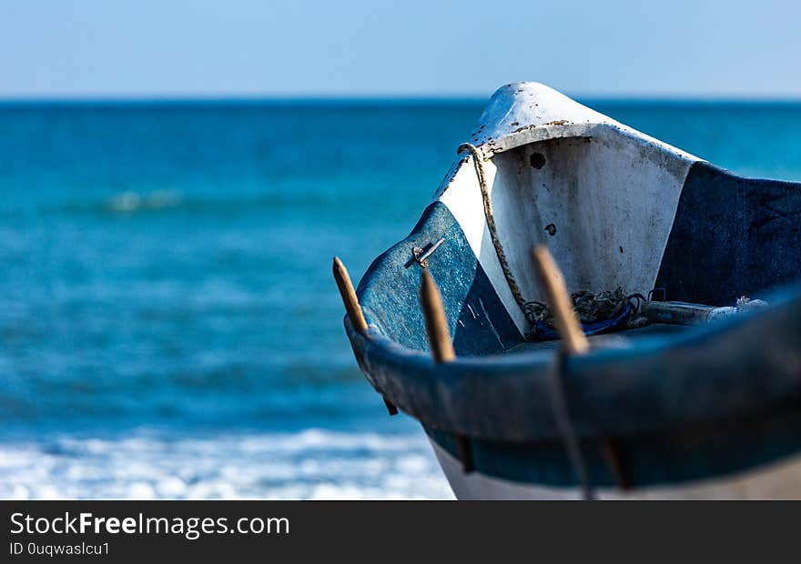 Close-up of a fishing boat interior with the sea in the background. Close-up of a fishing boat interior with the sea in the background