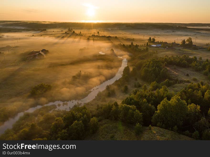 Sunset aerial atmospheric view on river in Ural Russia. Drone photography.