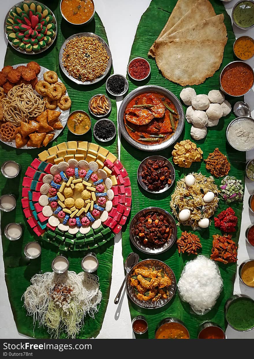 Flat lay of the taste of India. A selection of Indian food with various selection of food and desserts