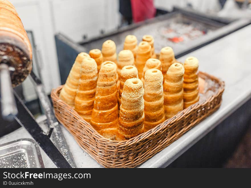 round delicacy cake Kurtoskalacs with the cinnamon and brown sugar