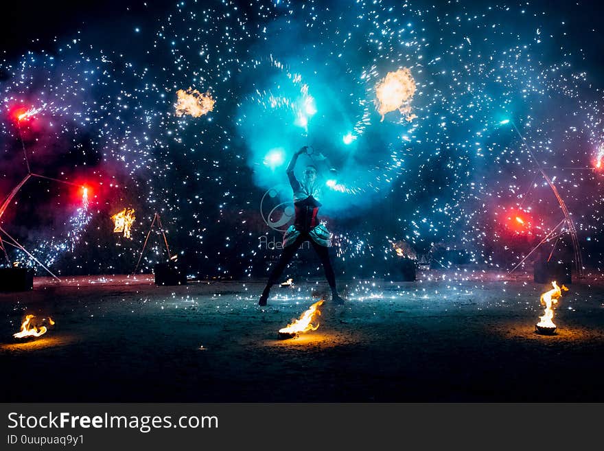 Fiery pieces of a fire show