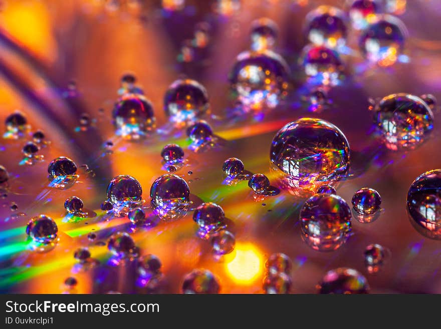 Reflection in drops of water.. Water drops full of color. Macro photography