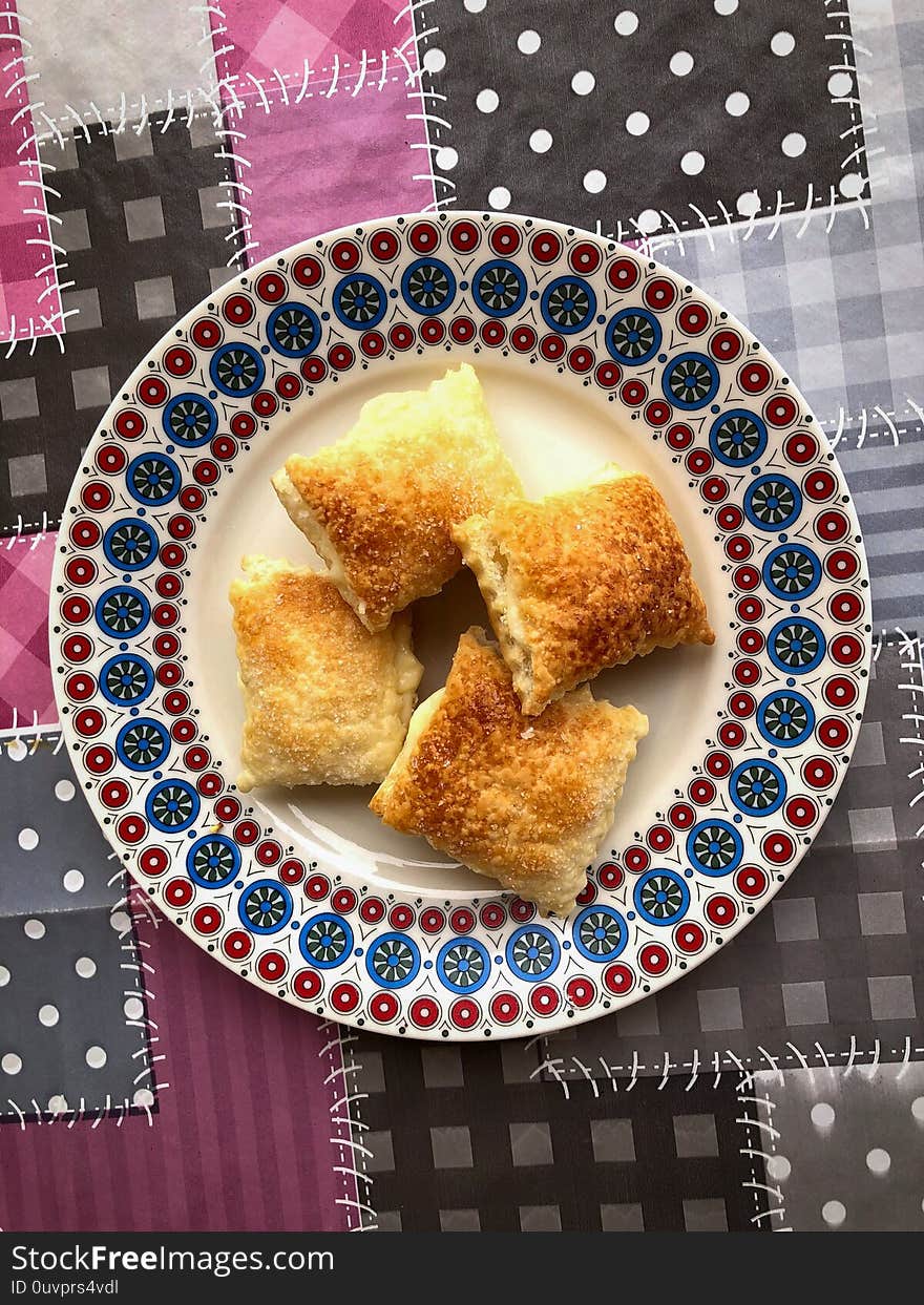 Sporcamusi, traditional fried pastries filled with cream from Puglia, Italy