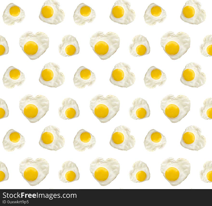 Heart shaped fried egg on white background closeup seamless pattern for design decoration