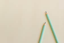 Pastel Colored Pencils On Empty Sheet Stock Photos