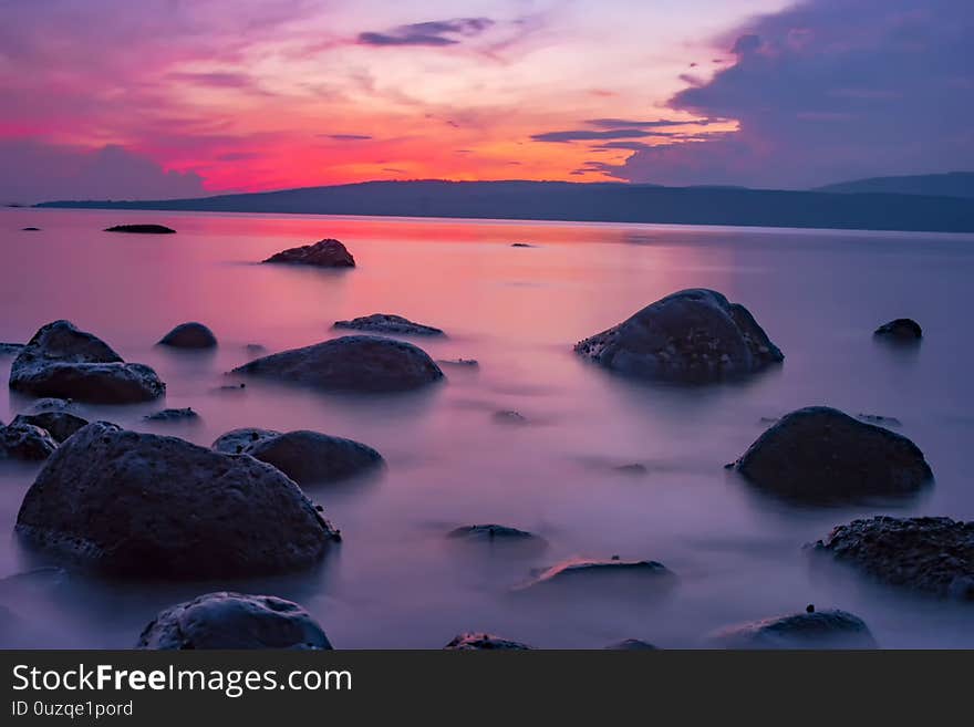 The rocks with high tide in the morning