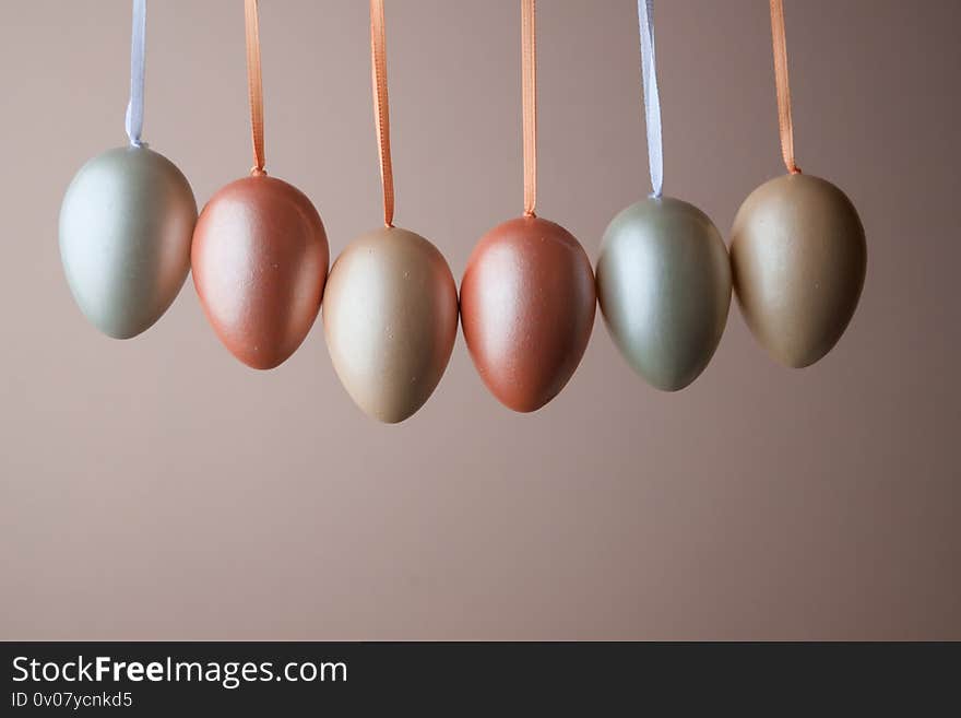 Decorated pearl easter eggs on a pink background. Minimal holiday concept. Happy easter background. a place for text