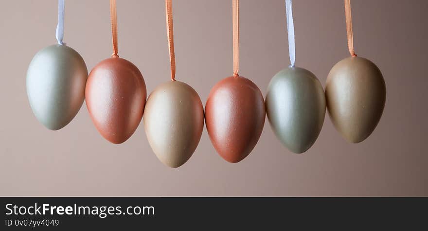 Decorated pearl easter eggs on a pink background. Minimal holiday concept. Happy easter background. a place for text