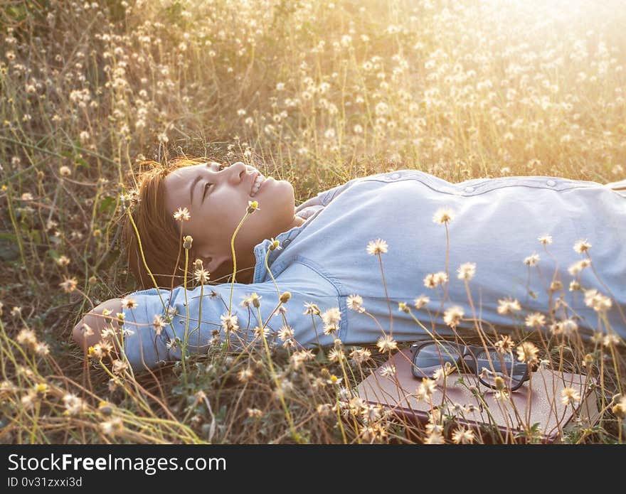 Beauty young woman with flowers and make up close , real spring girl