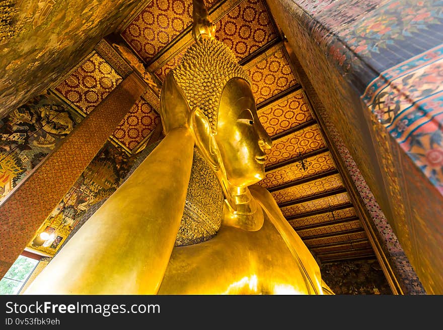 Reclining golden buddhist statue in Wat Pho, Thailand