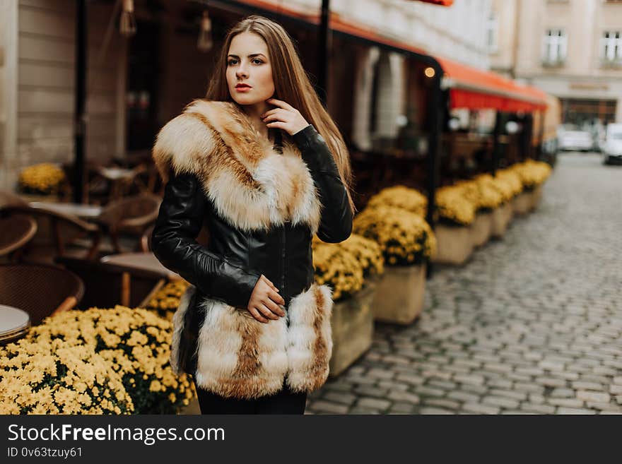 Beauty Fashion Model Girl in Fox Fur Coat.