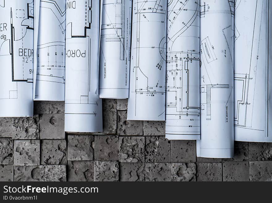 Architectural Blueprints On Grey Wall Backround