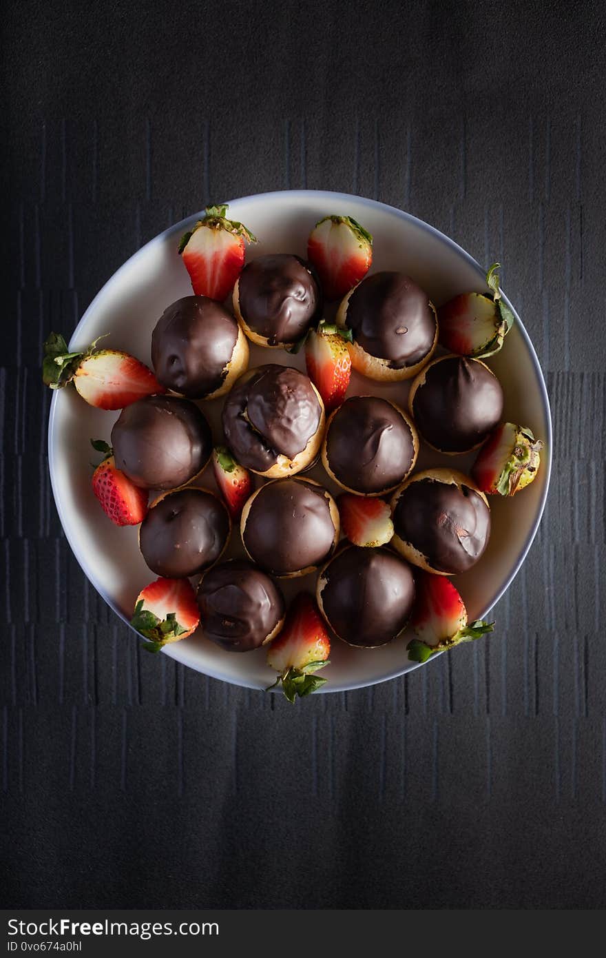 Chocolate Cream Puffs with Strawberries