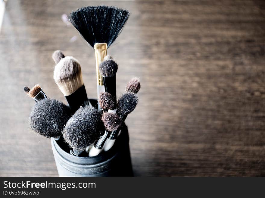 Cosmetology, a set of makeup brushes.