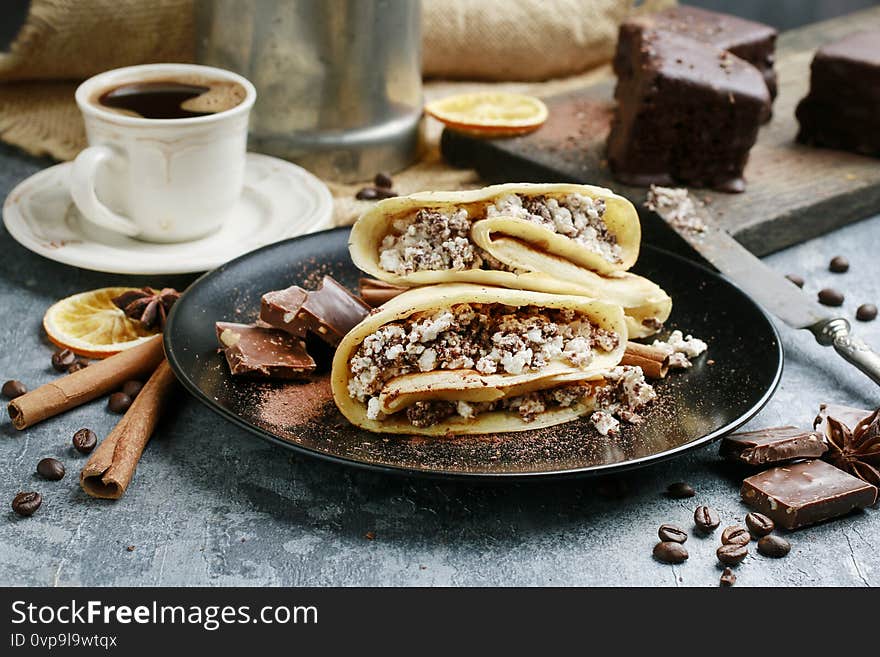 Crepes filled with chocolate and cottage cheese. Party dish